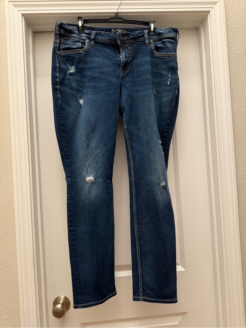 Silver Jeans Mid to Dark Blue Straight Leg with Subtle Distressing
